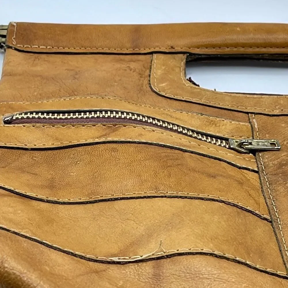 Vintage boho Leather Made in Hong Kong top handle bag.